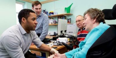 GP trainees consulting with an older couple