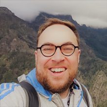 Photo of Seb Pillon with mountain behind