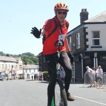 Photo of Julian Page unicycling